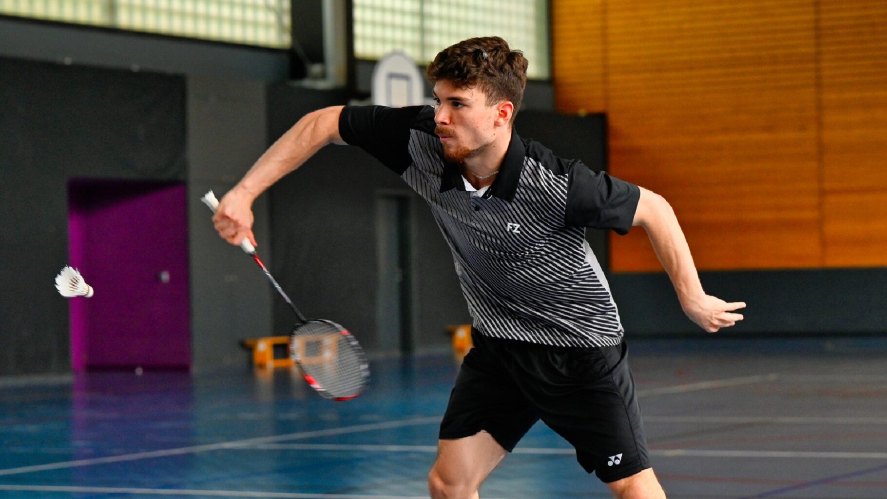 CREPS a Stg - Sportif jouant au badminton